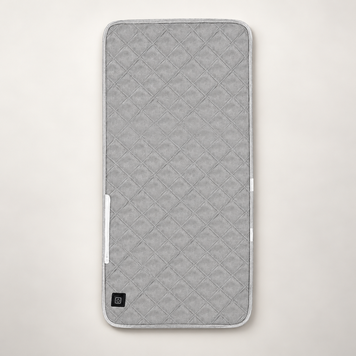 ORVO USB heated seat pad, 45 × 90 cm, in grey quilted fabric with a power button at the bottom