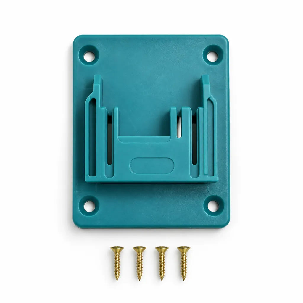 Four cordless tools hanging in turquoise tool holders on a wooden garage wall