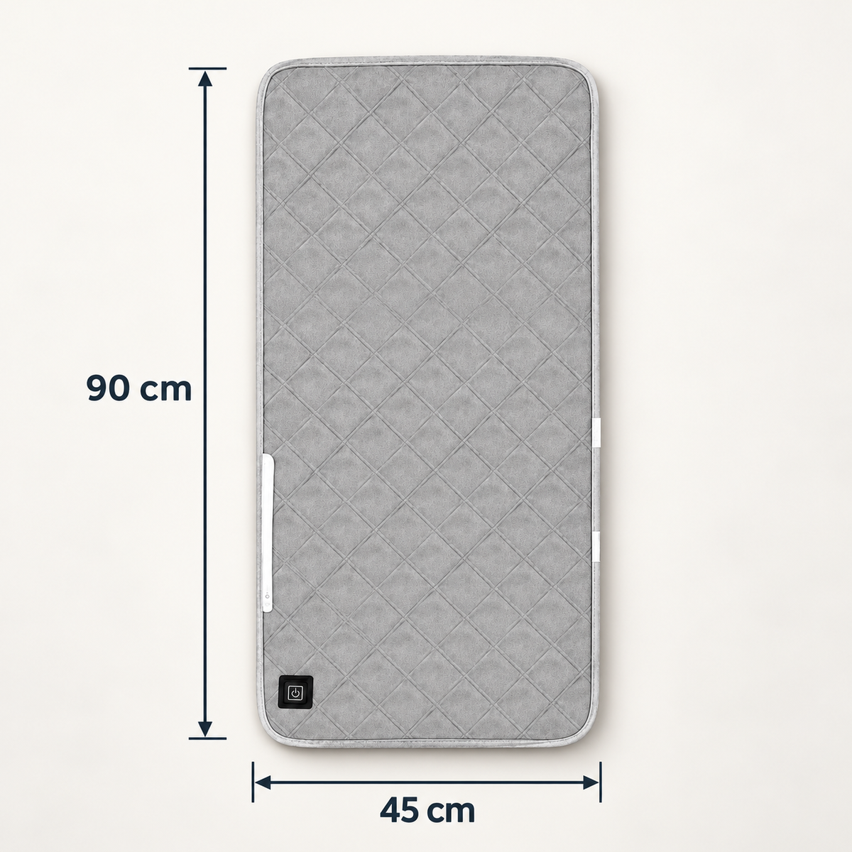ORVO heated seat pad with arrows marking 45 cm width and 90 cm length